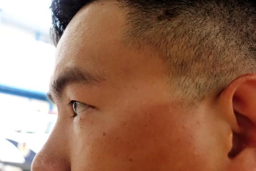 珠海交警在烈日下晒出了口罩印.(央广网发 珠海交警供图)