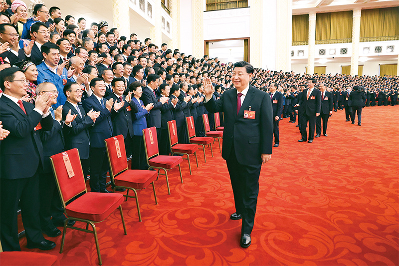 中央军委主席习近平等领导同志在北京人民大会堂亲切会见出席党的二十