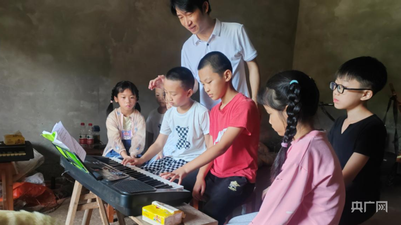 重庆忠县农家堂屋 孕育孩子们的音乐梦想