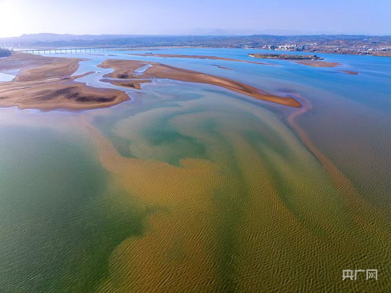 洛阳市孟津区春日黄河呈现牡丹沙画